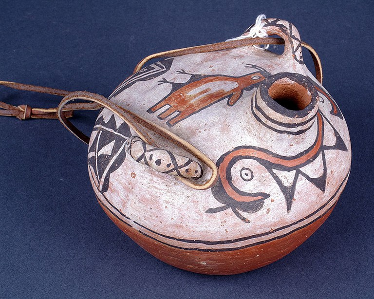 A vintage Native American pottery canteen.