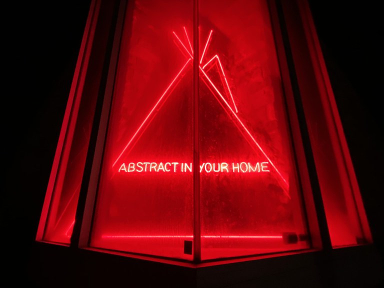 Red neon lights in tubing with ABSTRACT IN YOUR HOME