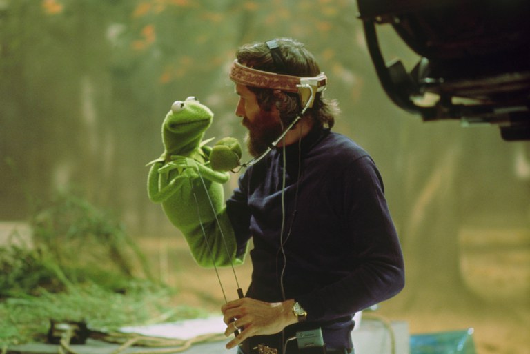Jim Henson and Kermit the Frog on the set of The Muppet Movie.