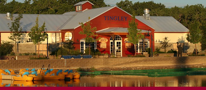 Tingley Beach facing the main building with the water in the foreground.