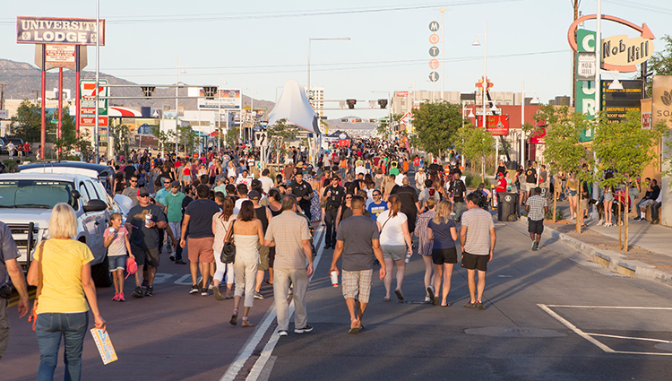 A Crowd of People Walking Down Central in the Nob Hill Area