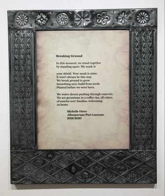 Punched tin frame by Roberto Gallegos with ornate patterns and images, for Michelle Otero's poetry excerpt "Breaking Ground."