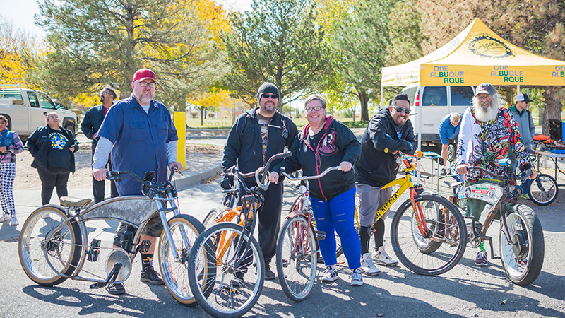 Adults Posing with Bikes Section Highlight Block