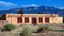 Stucco Building in Front of Sandias