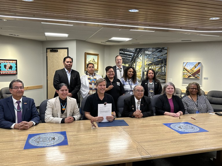Mayor Tim Keller, District 7 City Councilor Tammy Fiebelkorn sign legislation to consult tribal members in land use decisions