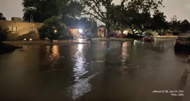 Photo of typical flooding occurring in the Pueblo Alto and Mile Hi Neighborhoods