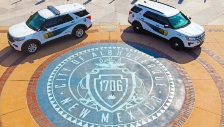 Metro Security Vehicles parked next to the Albuquerque City seal on Civic Plaza.