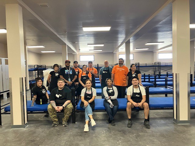 Group Photo after volunteers completed building beds at Gateway West