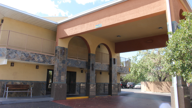 The drive up entry to a motel that has been converted to housing.