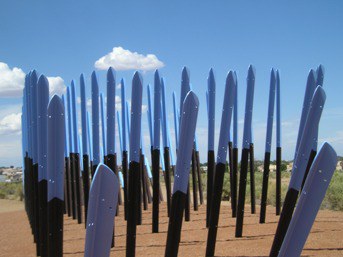 Metal rods coming out of the ground.