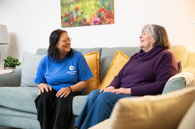 Volunteer walking senior