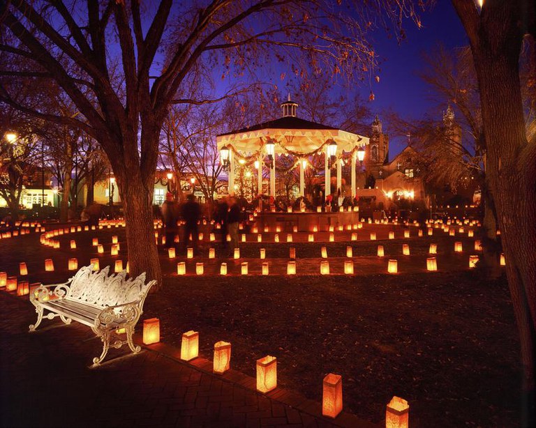 Beautiful luminarias aglow at the Luminaria Tour in the heart of Old Town Albuquerque